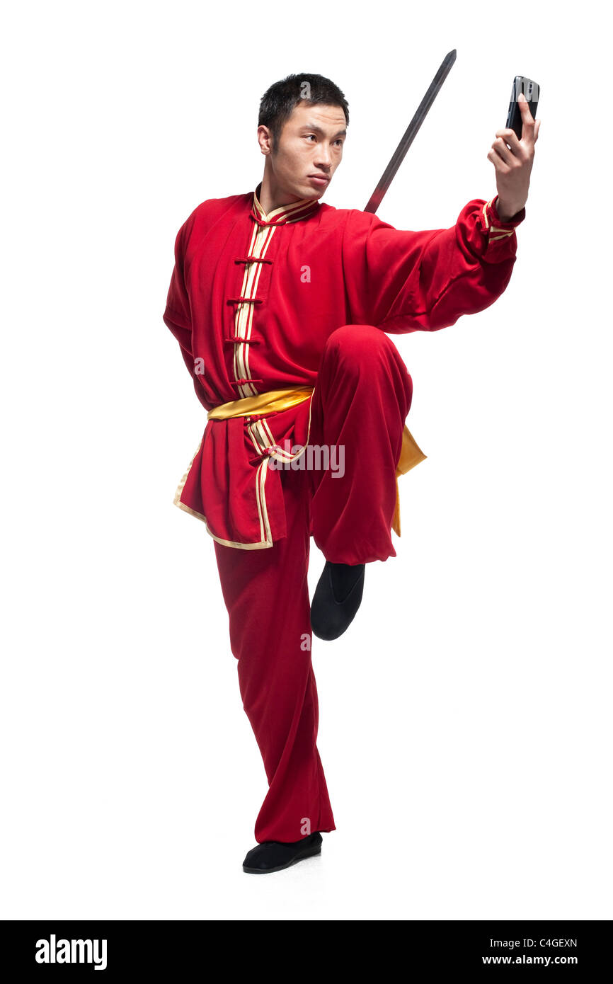 Focused Man Doing Martial Arts in Chinese Clothing Stock Photo Alamy