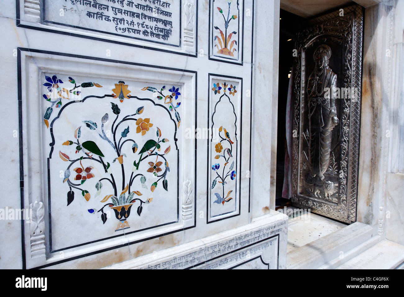 India - Punjab - Amritsar - Sri Durgiana temple - ornate marble inlay and silver doors Stock Photo