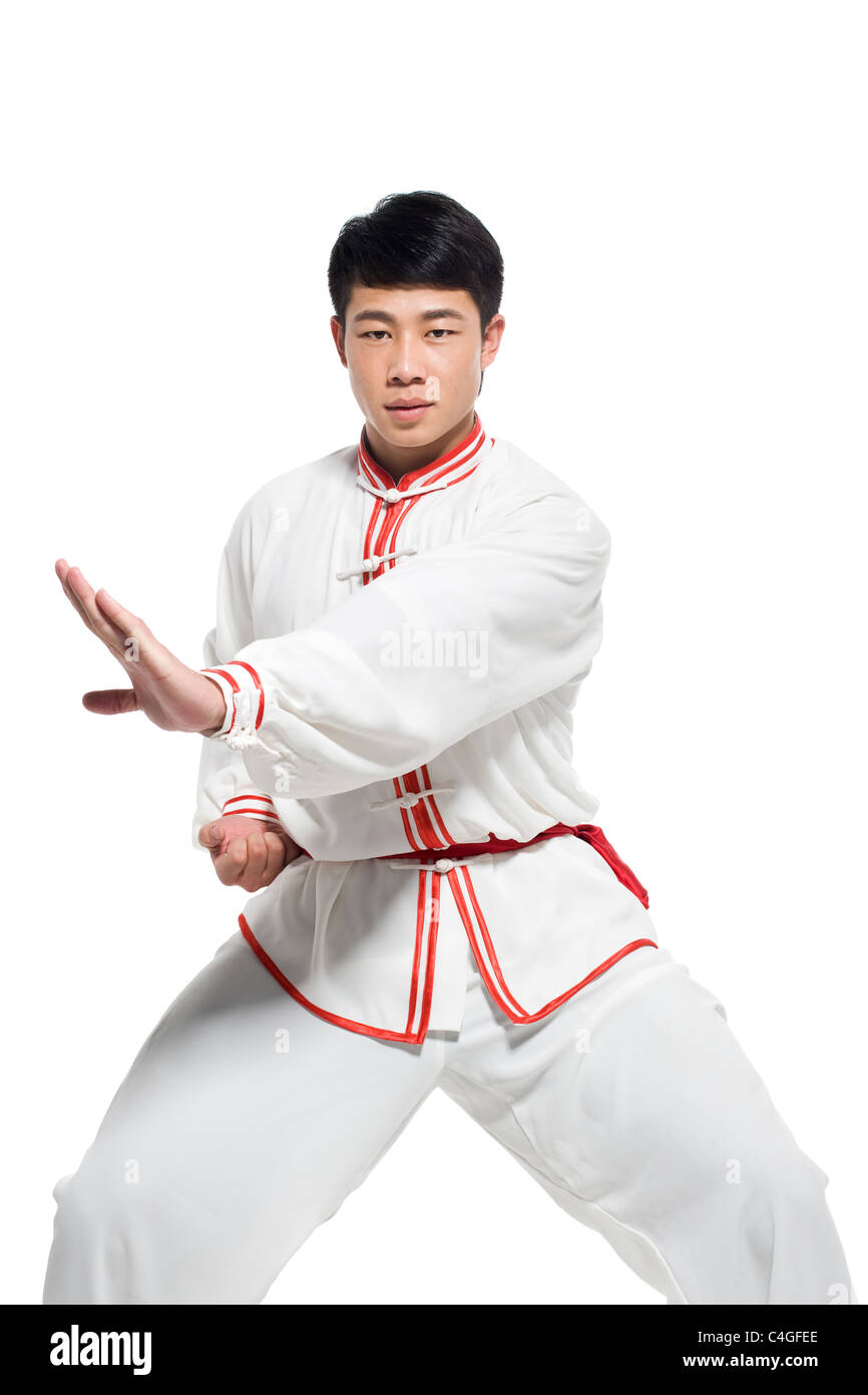 Man in Traditional Chinese Clothing Doing Taijiquan Stock Photo