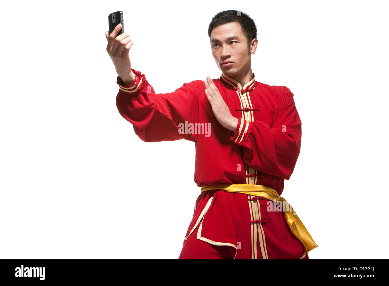 Focused Man Doing Martial Arts in Chinese Clothing Stock Photo Alamy
