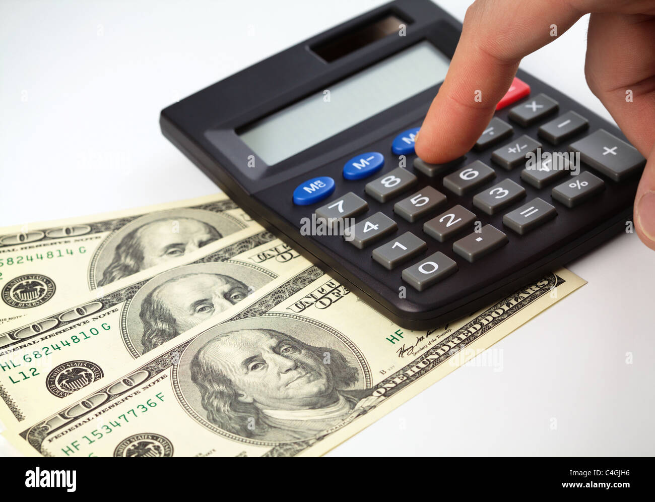 Calculator and few hundred dollars - accounting concept Stock ...