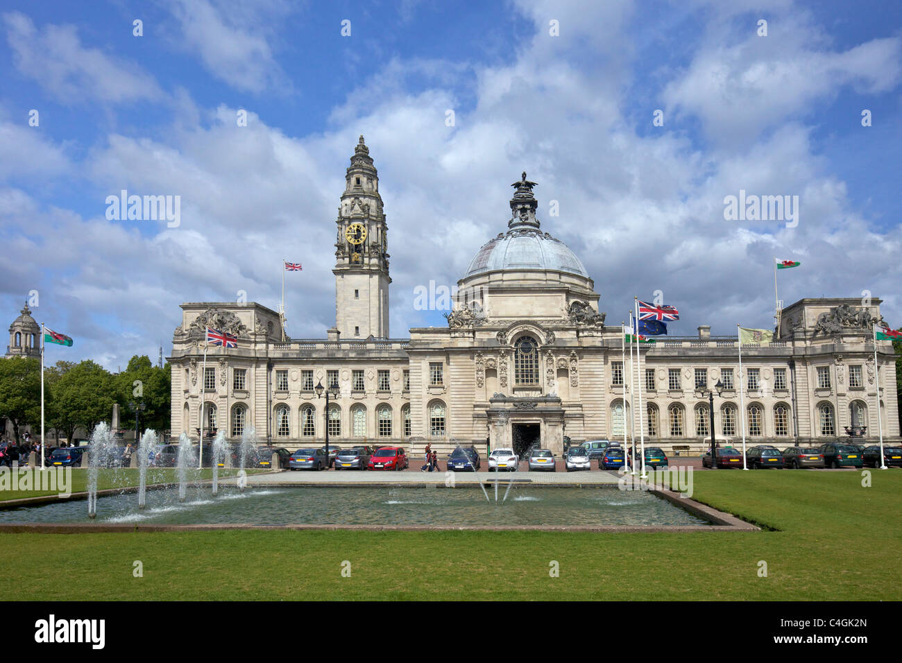 Fountains in front of Cardiff City Hall Clock Tower Cardiff city centre  Wales Cymru UK Stock Photo