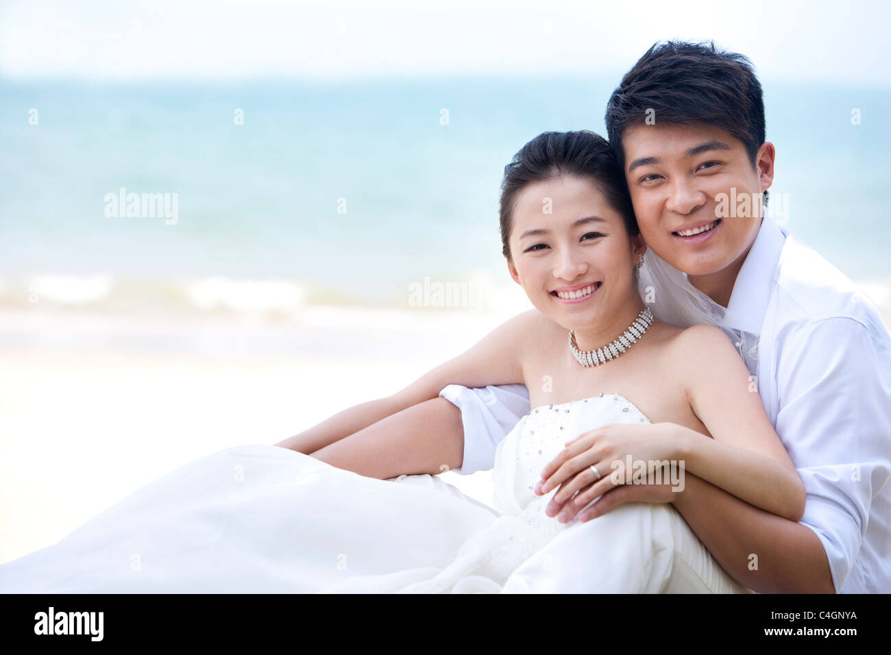 Sitting newlyweds hi-res stock photography and images - Alamy
