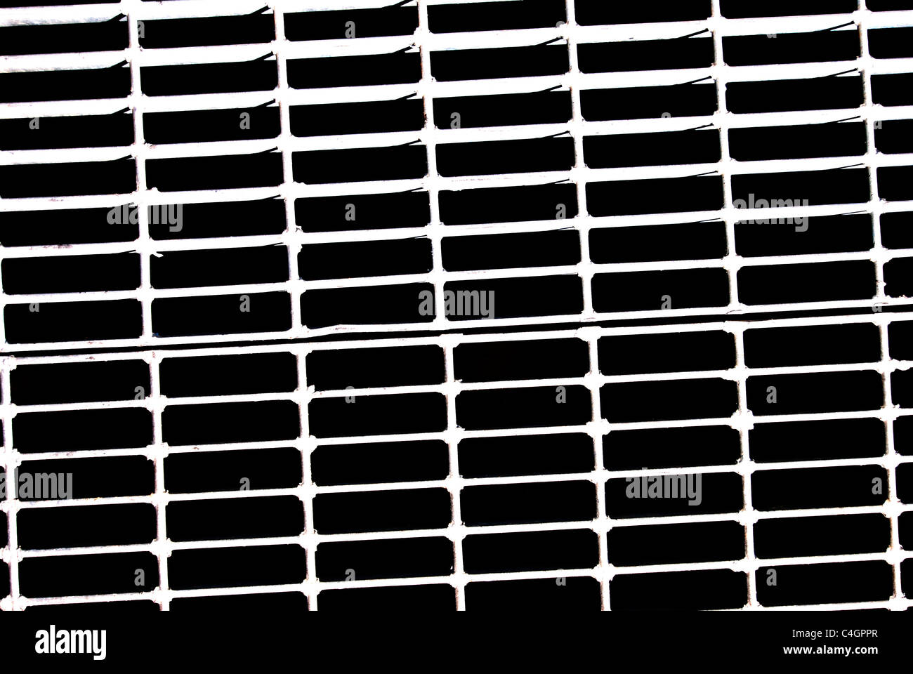 A close up of a Sewer grate Stock Photo