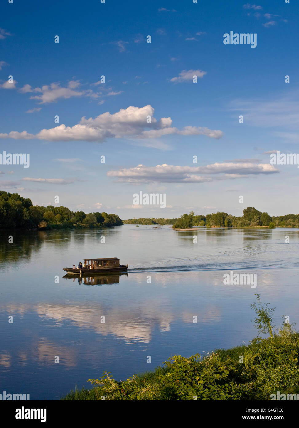 Wooden motor boat on the River Loire at Candes St Martin, Loire Valley, France Stock Photo