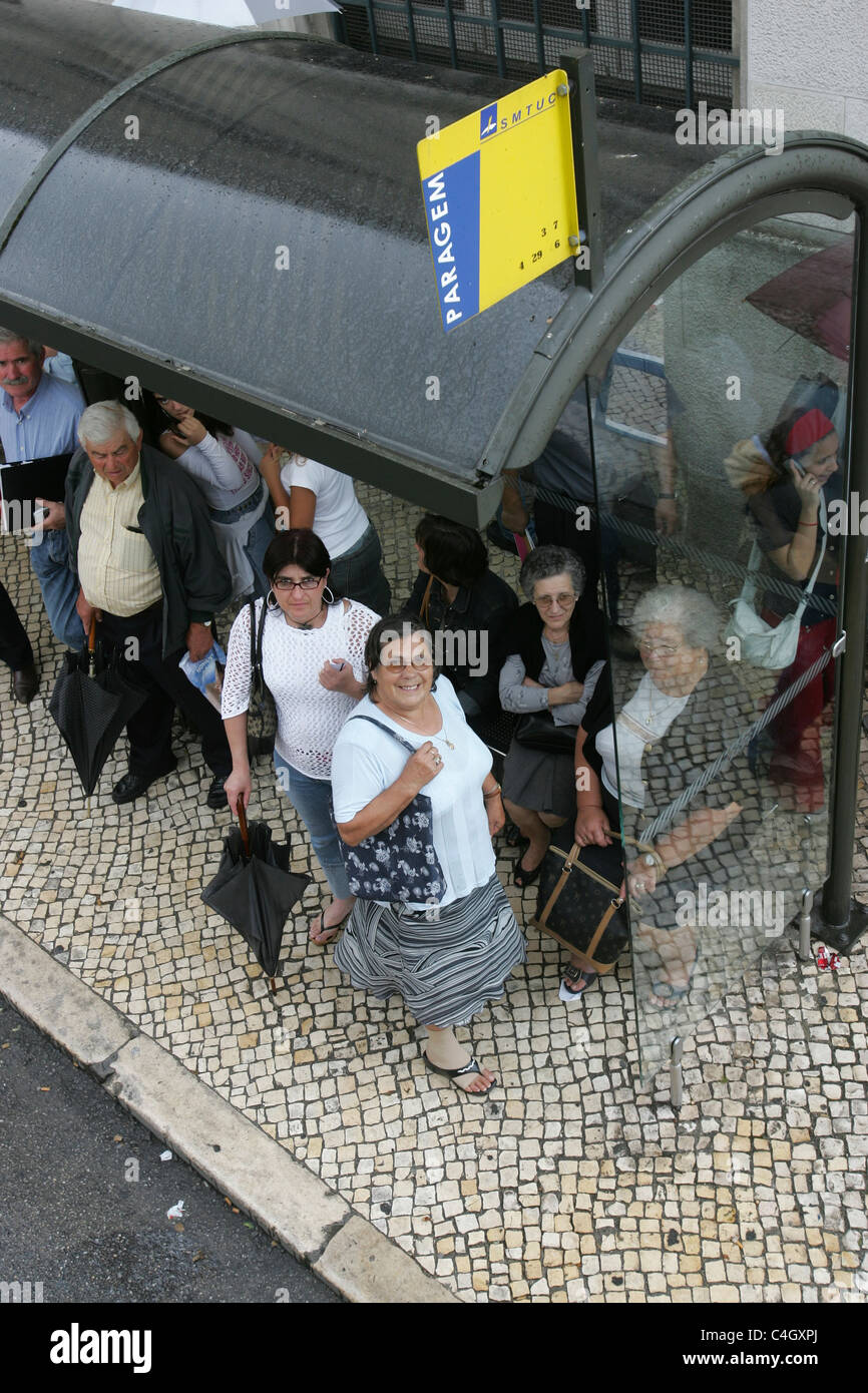 High angle view of people waiting for bus at a bus stop, Coimbra, Portugal, Europe Stock Photo