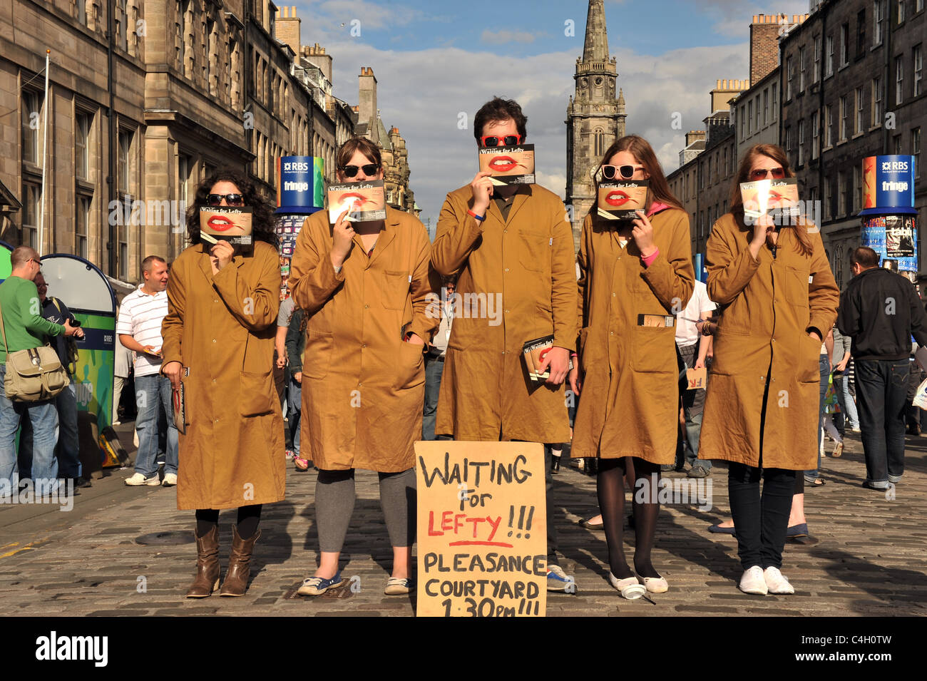 Edinburgh Festival performers on the Royal Mile publicising their act Stock Photo