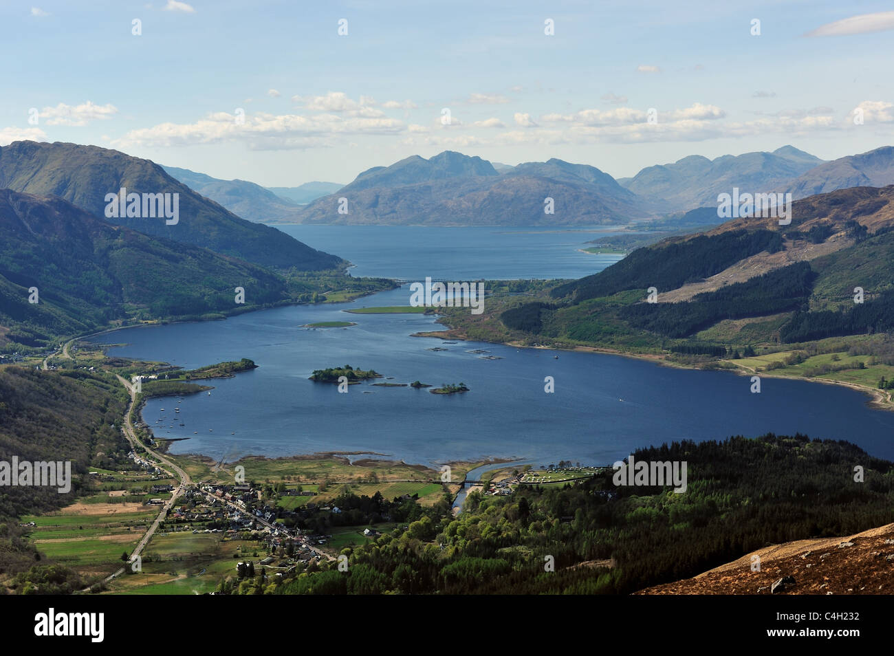 Looking down from the summit of the Pap of Glencoe onto Loch Leven, towards Glencoe Village, Ballachulish and the Mamores Stock Photo