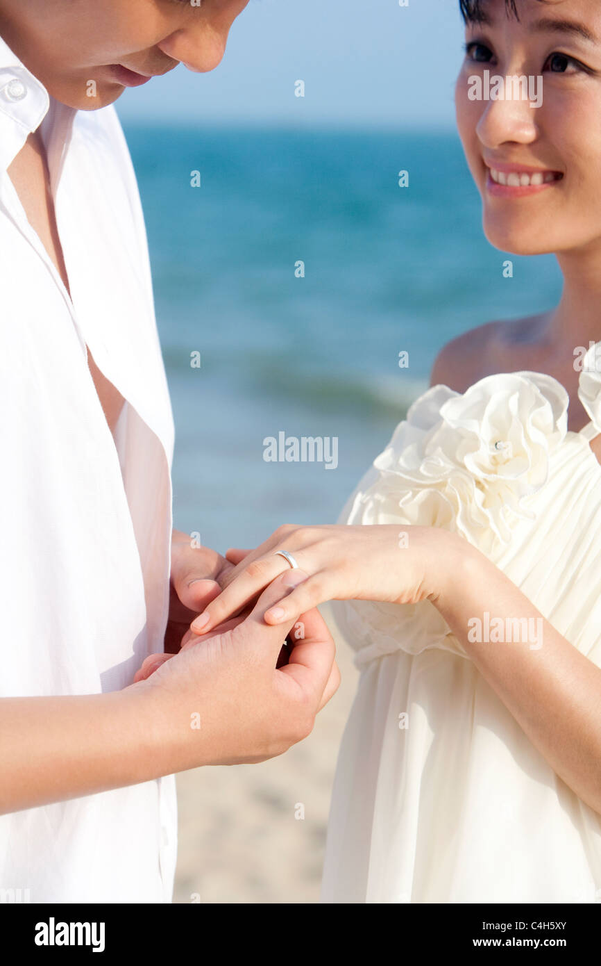 Newlyweds Holding Hands Stock Photo - Alamy