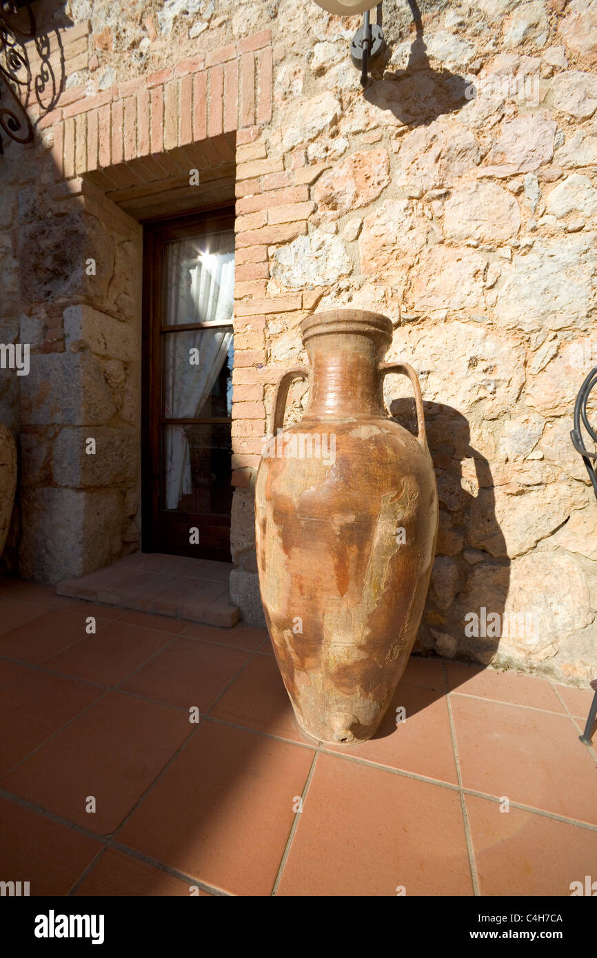 Terracotta Vase On The Patio Of A Tuscan House Barigianino Rosia