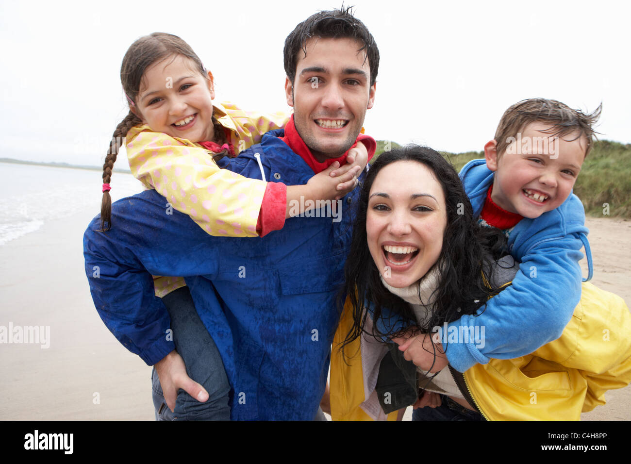 Happy family on beach Stock Photo