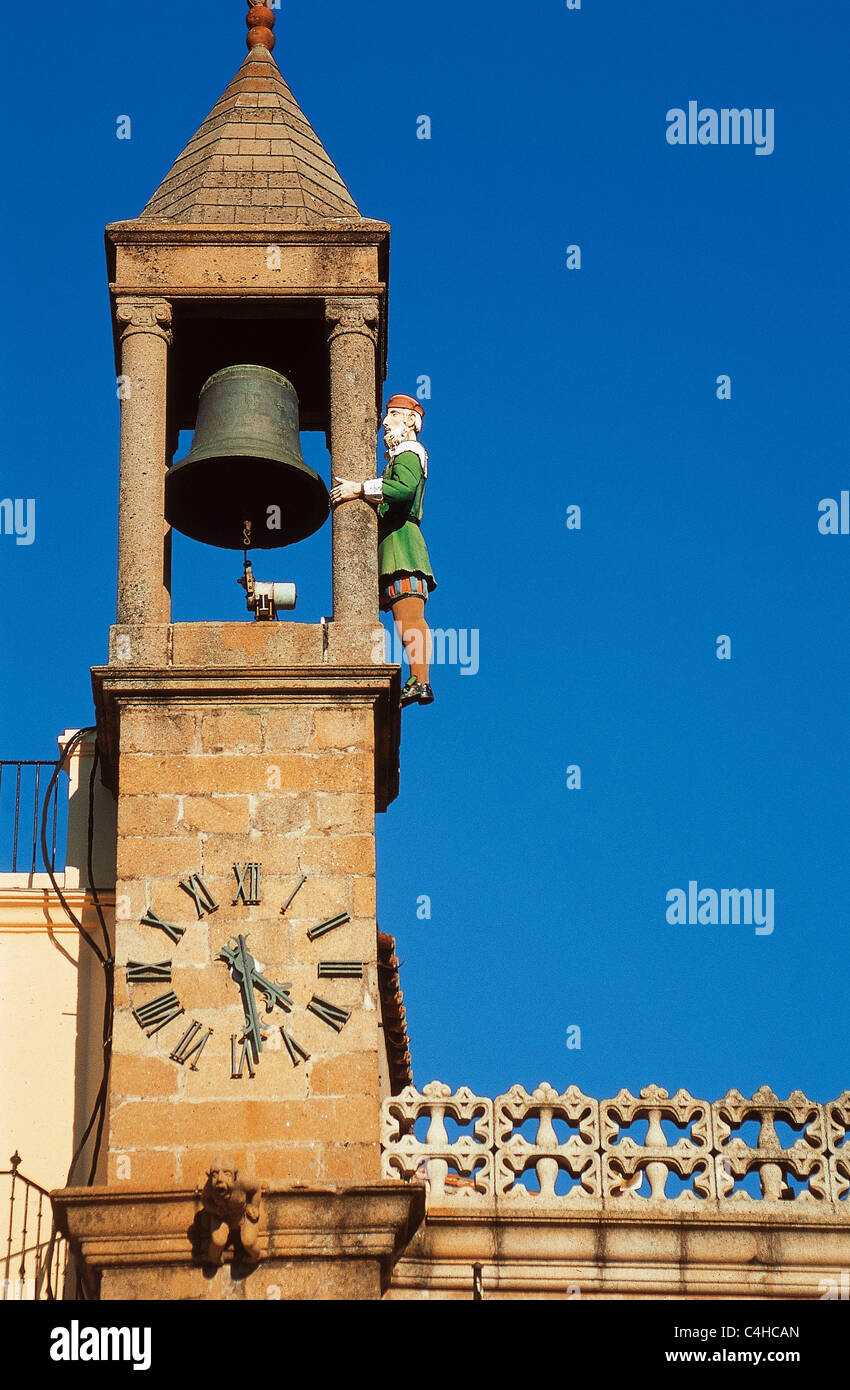 Plasencia City Hall (16th century). Detail of the bell tower with the figure of Mayorga Grandfather (1723). Extremadura. Spain. Stock Photo