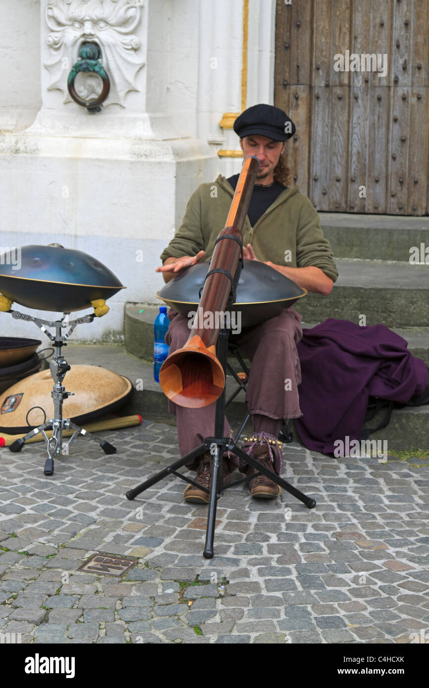 Street entertainer in front of the Chancellery in Burg Square, Bruges, Belgium Stock Photo