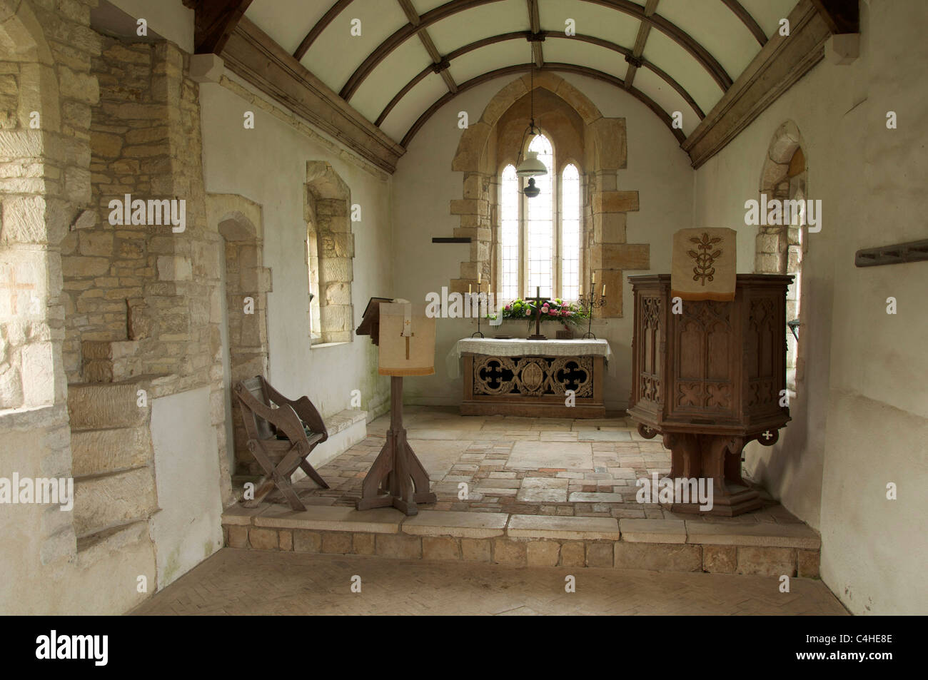 The chancel of the redundant 12th century church at Whitcombe near Dorchester. The poet William Barnes was curate here from 1847 to 1852. Dorset, UK. Stock Photo
