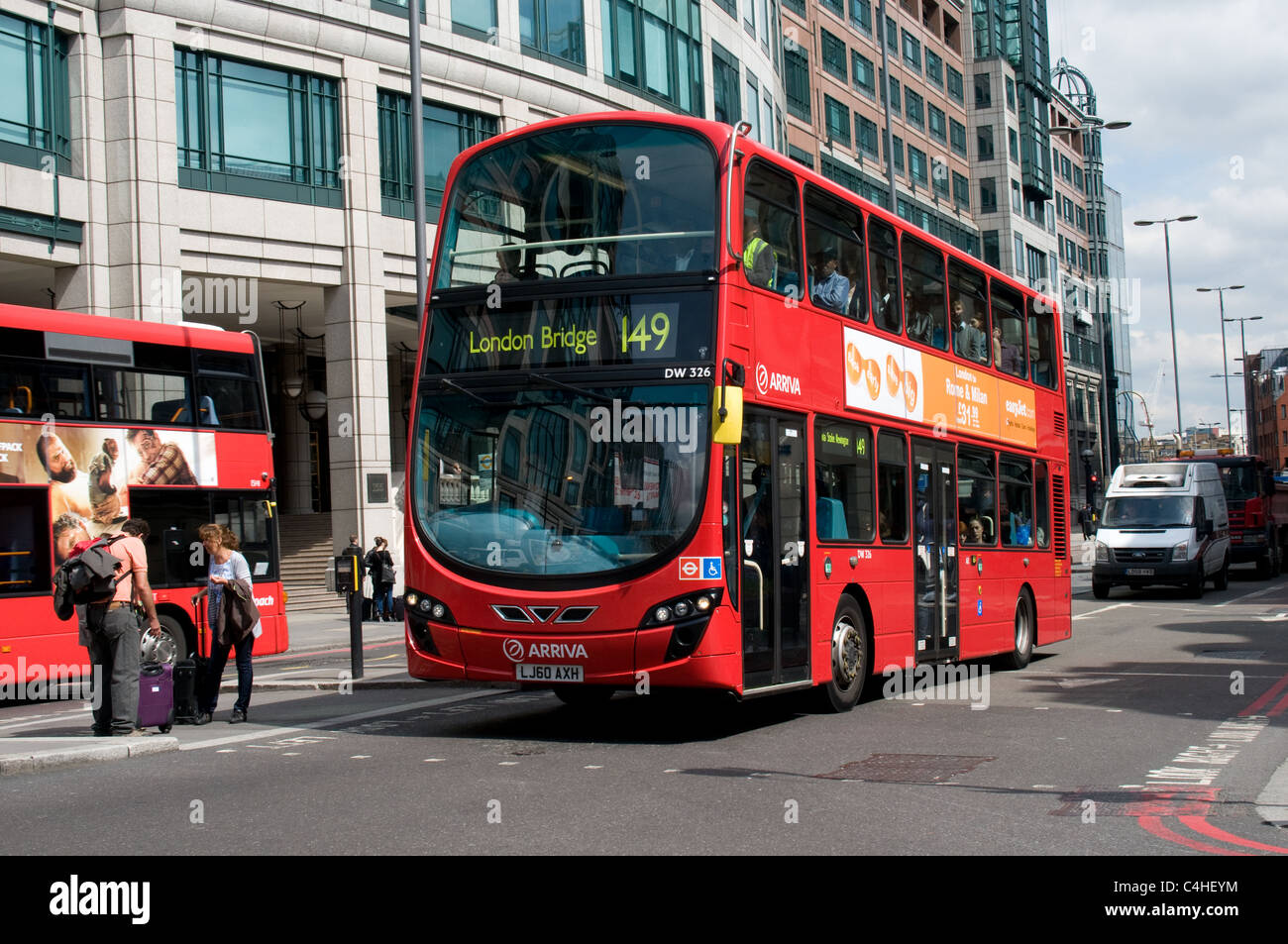 A modern London bus travels along Bishopsgate near Liverpool Street station heading for London Bridge bus station. Stock Photo