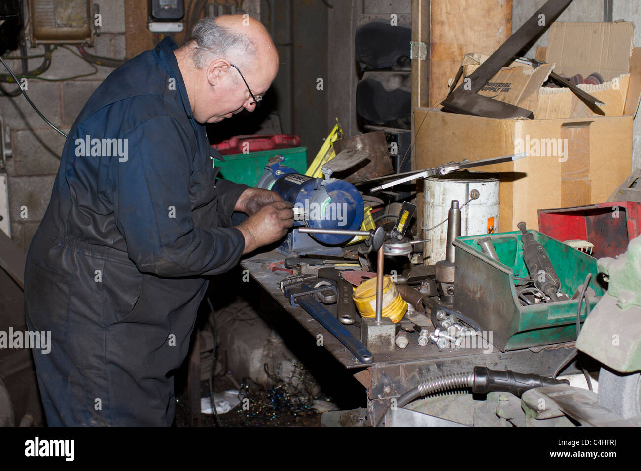 Regrinding a cutting tool Stock Photo Alamy