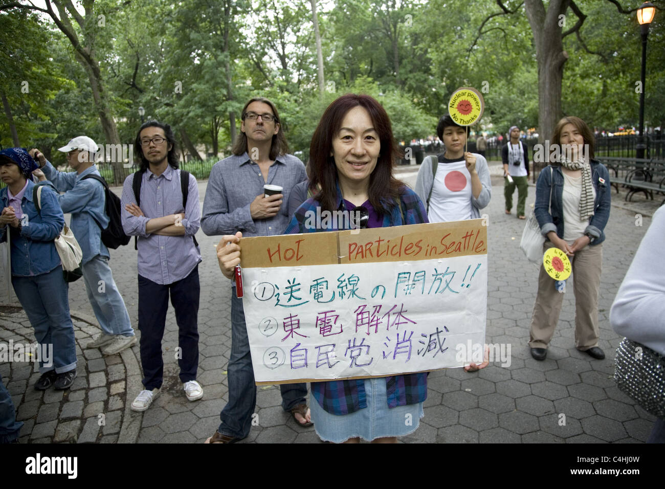 Antinuclear activists rally and march on the 3 month anniversary of the nuclear disaster at Fukushima, Japan. New York City Stock Photo