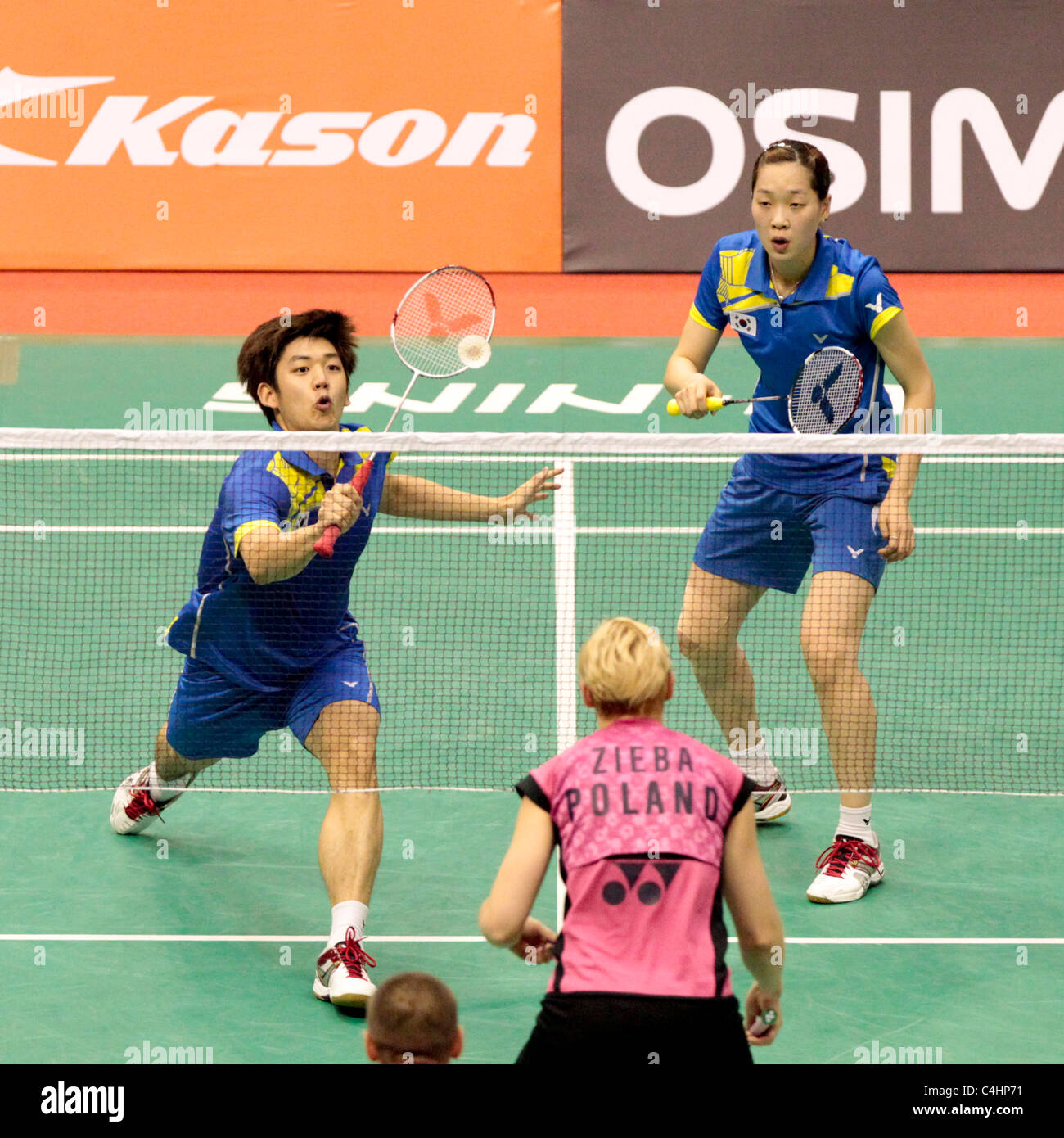 Lee Yong Dae and Ha Jung Eun of Korea during their Mixed Doubles Round 2 match, Li-Ning Singapore Open 2011. Stock Photo