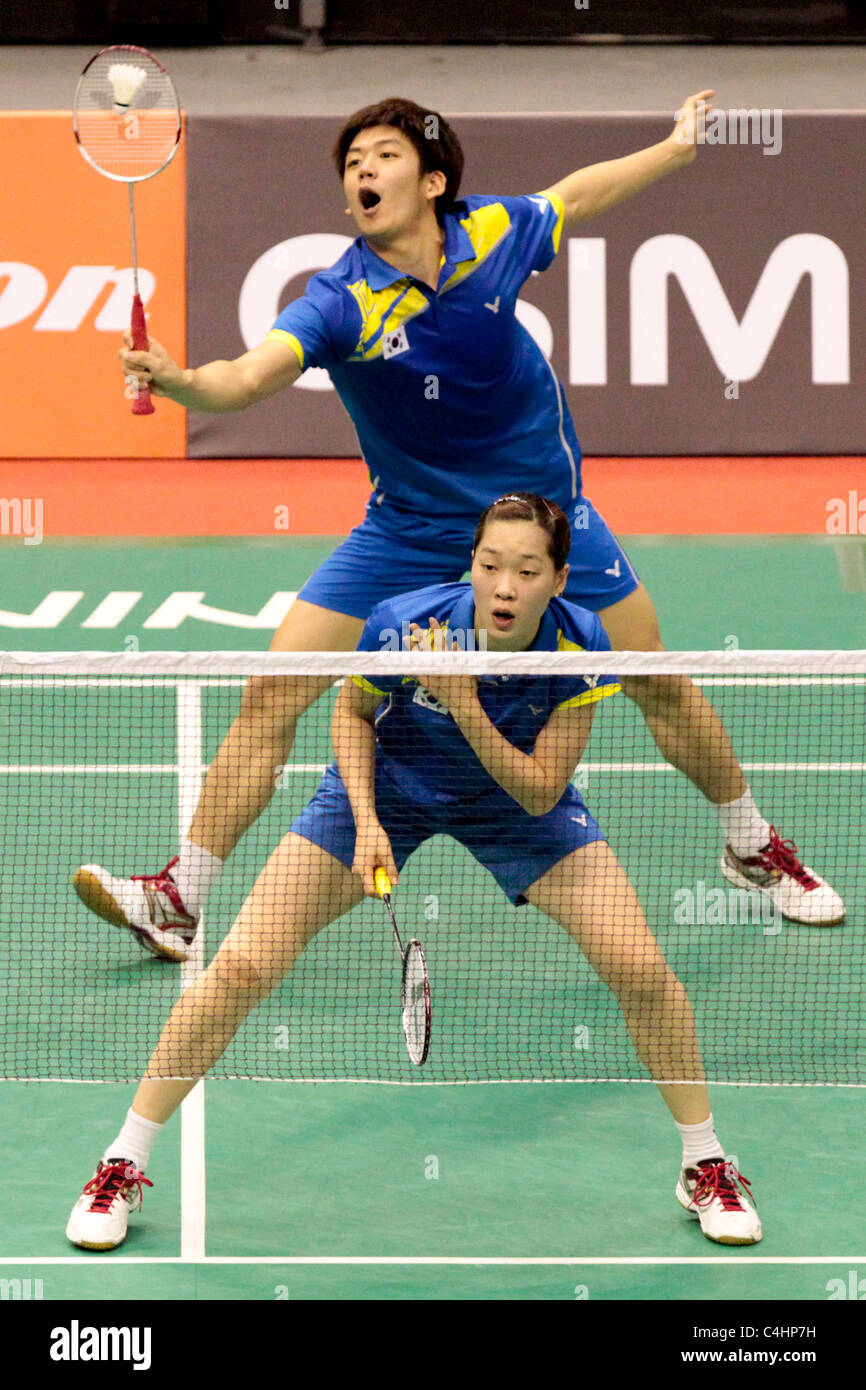 Lee Yong Dae and Ha Jung Eun of Korea during their Mixed Doubles Round 2 match, Li-Ning Singapore Open 2011. Stock Photo