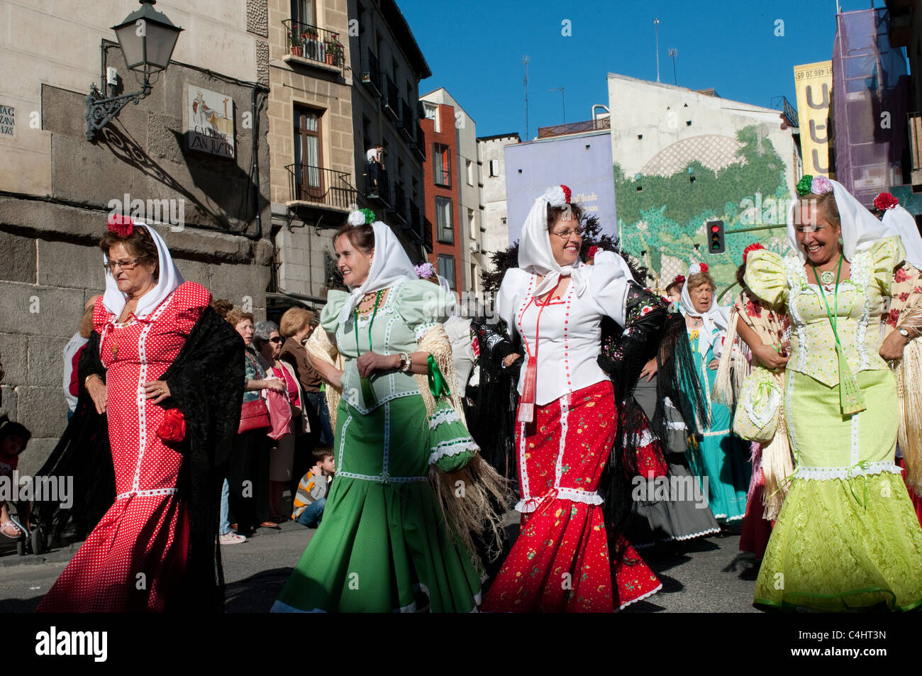 People dressed in traditional clothes during religious procession for Festival of San Isidro, Madrid, Spain Stock Photo