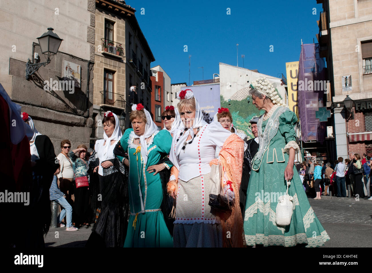 People dressed in traditional clothes during religious procession for Festival of San Isidro, Madrid, Spain Stock Photo