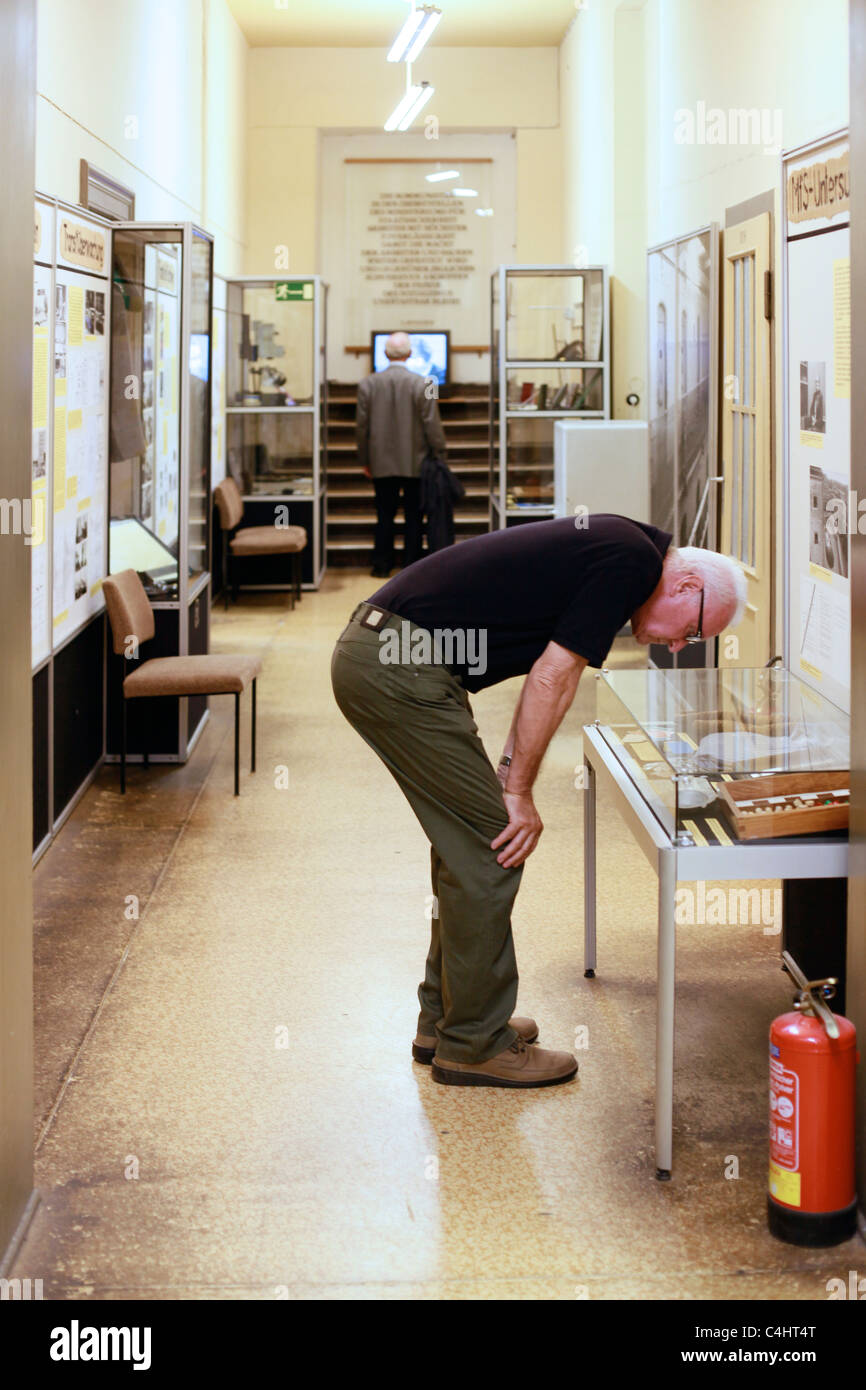Visitor in Museum in der Runden Ecke Museum in the Round Corner Housed in the former Stasi headquarters Leipzig Eastern Germany Stock Photo