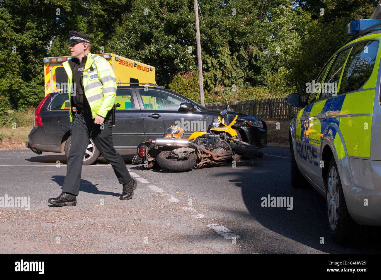 Aftermath of a road traffic accident involving a car & a motorbike. Stock Photo