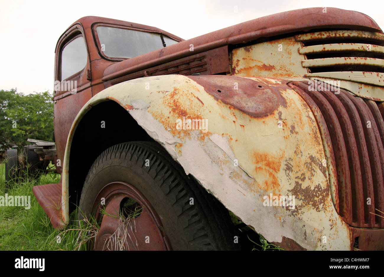 RUSTY OLD TRUCK IN A FIELD BDB Stock Photo