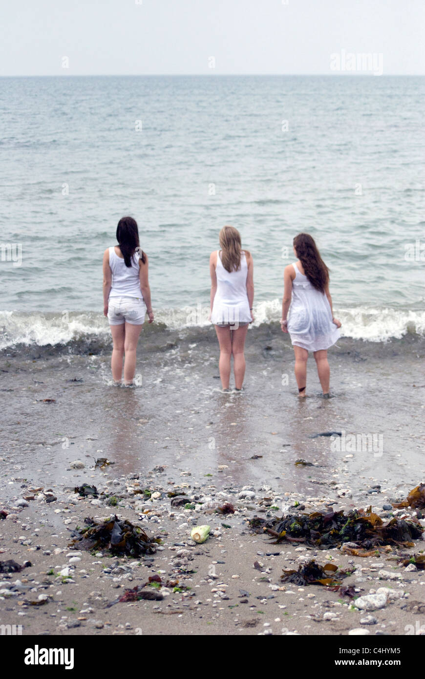 three girls in sea Stock Photo