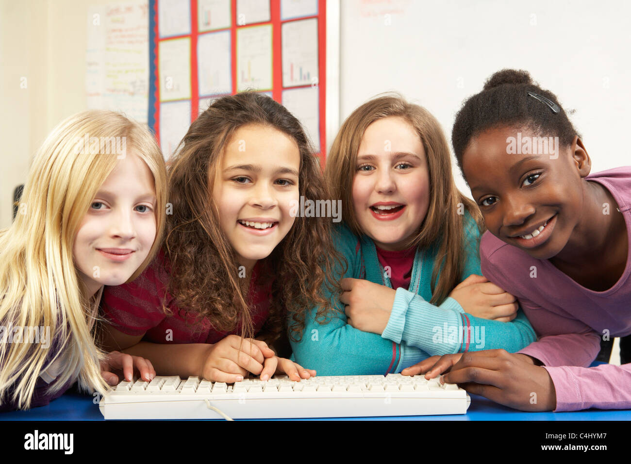 Group Of Schoolgirls In IT Class Using Computer Stock Photo - Alamy