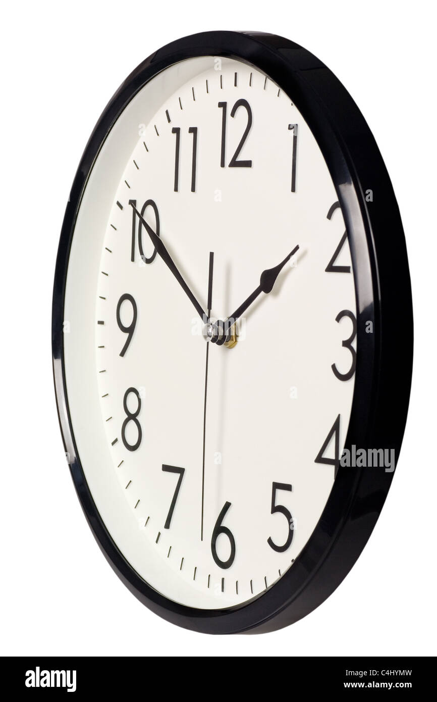 Closeup of a simple analog clock isolated on white background Stock