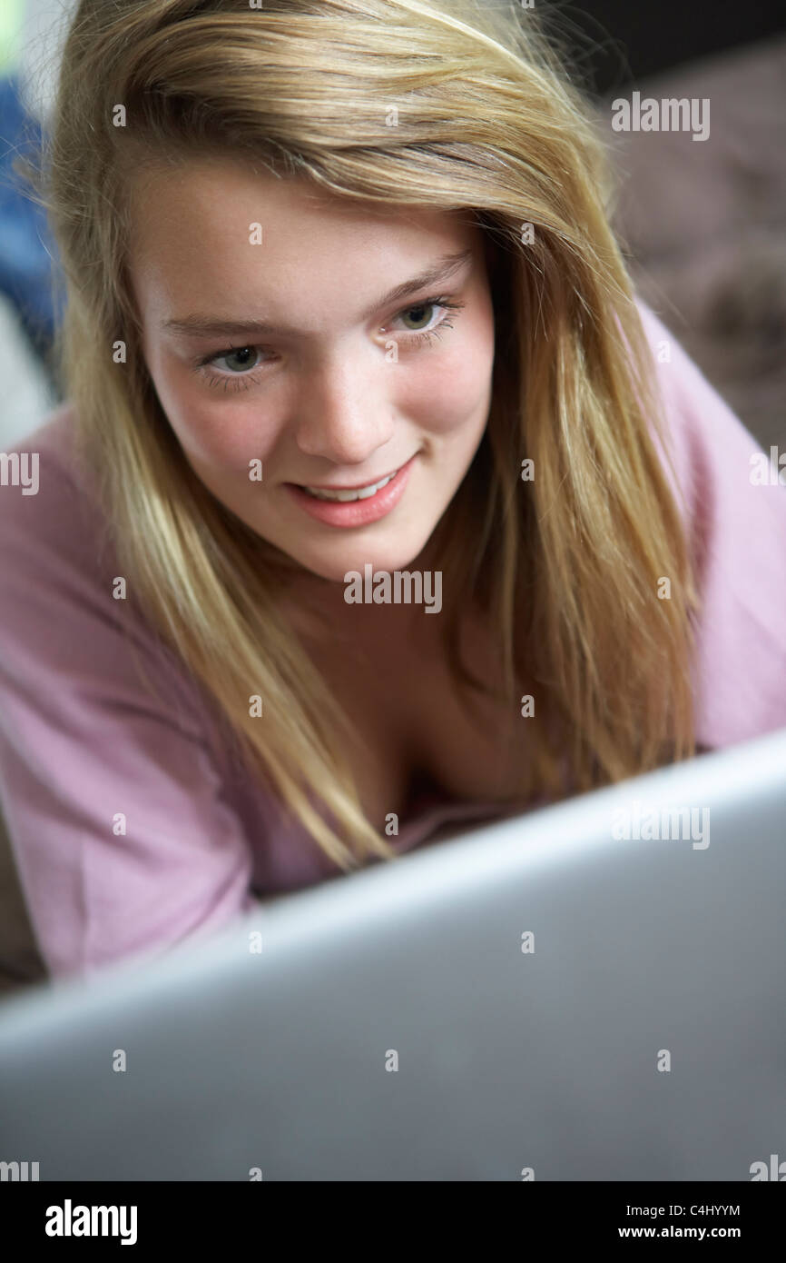 Teenage Girl Using Laptop At Home Stock Photo - Alamy
