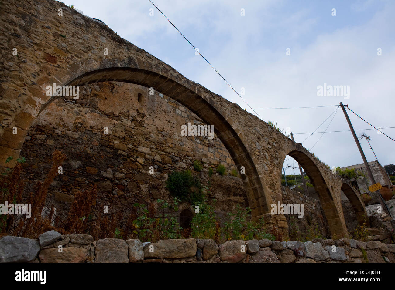 Polyrinia An aquaduct in the ancient Hellenic city of Polyrinia, Crete Stock ...
