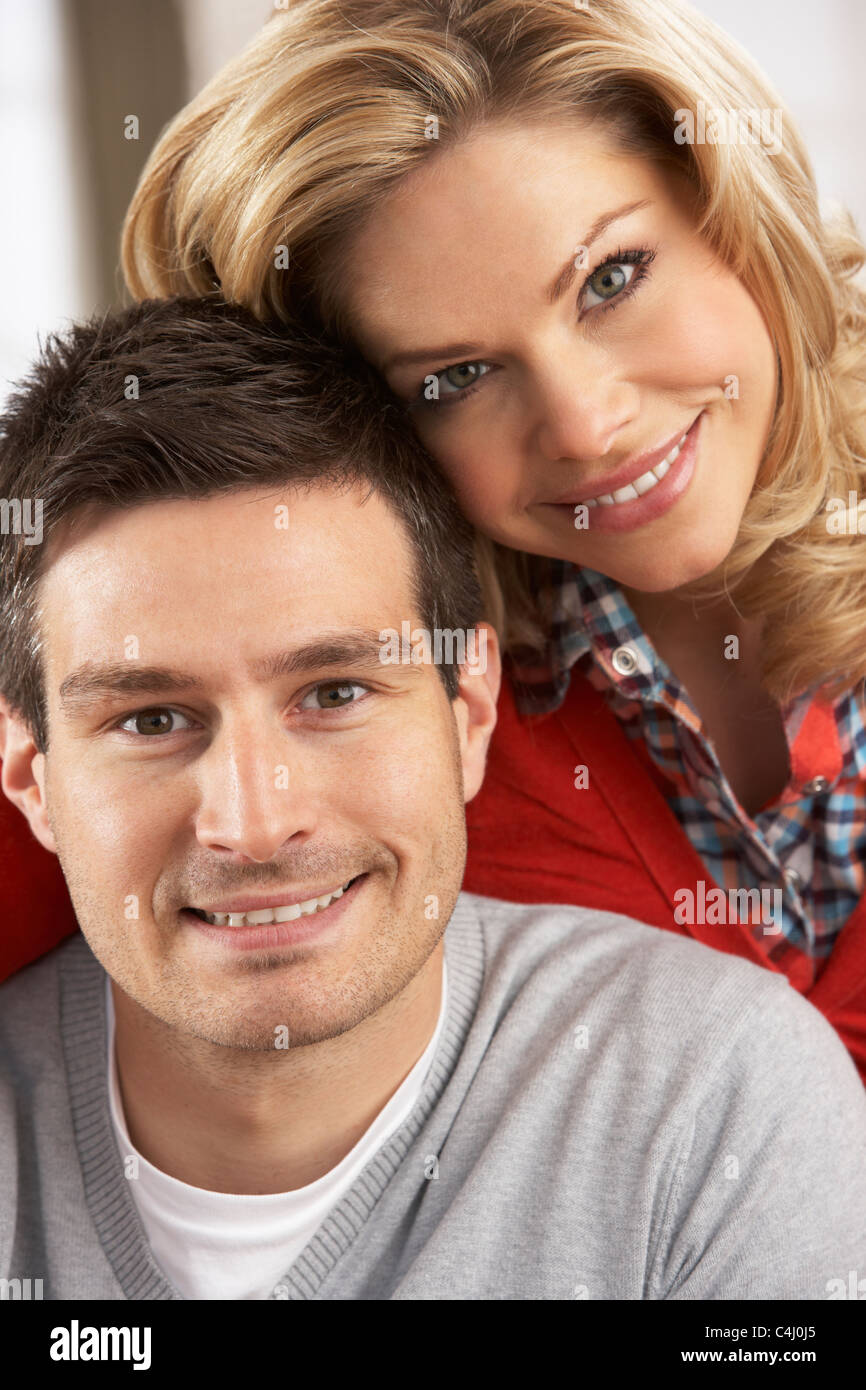 Portrait Of Happy Young Couple At Home Stock Photo - Alamy
