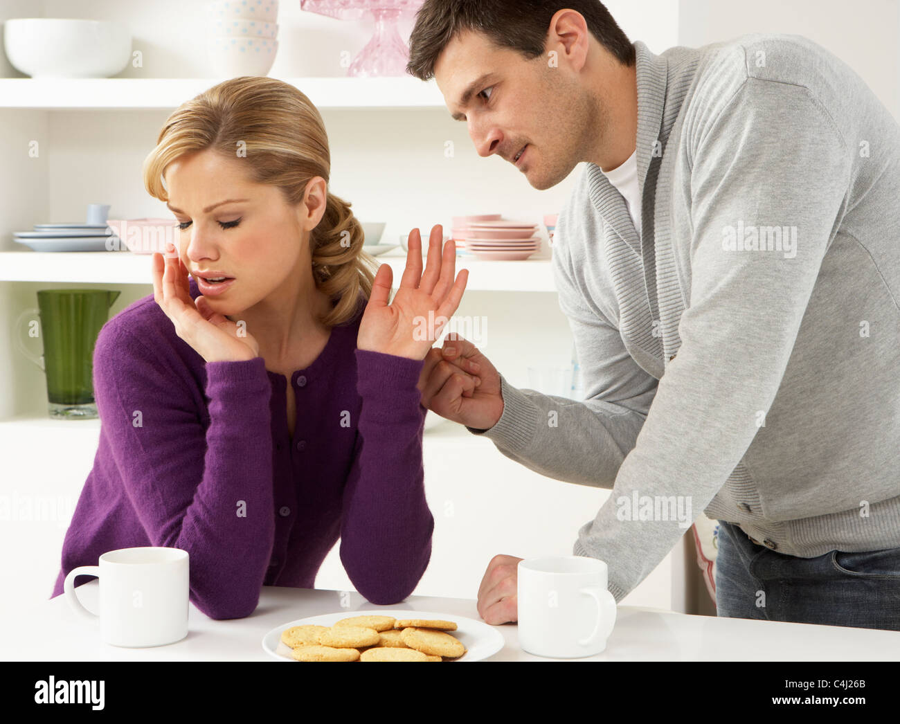 Couple Having Argument At Home Stock Photo