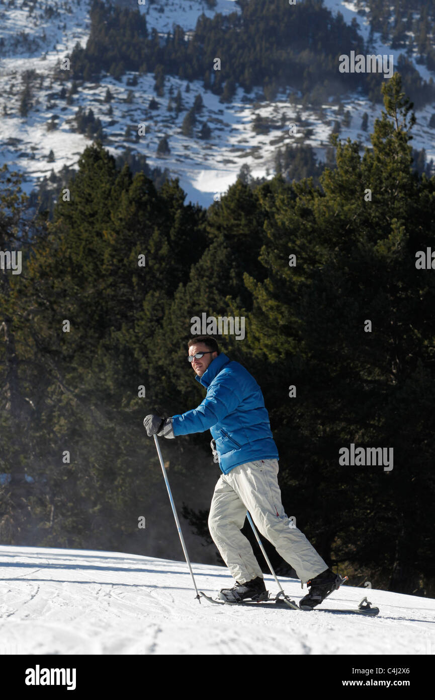 Man walking in snowshoes in the Spanish Pyrenees Stock Photo Alamy