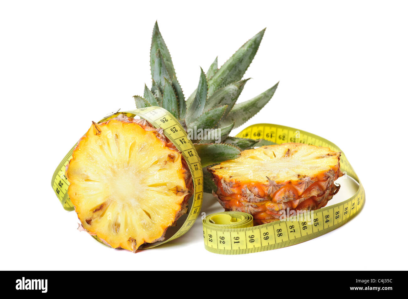Pineapple with a measuring tape around Stock Photo