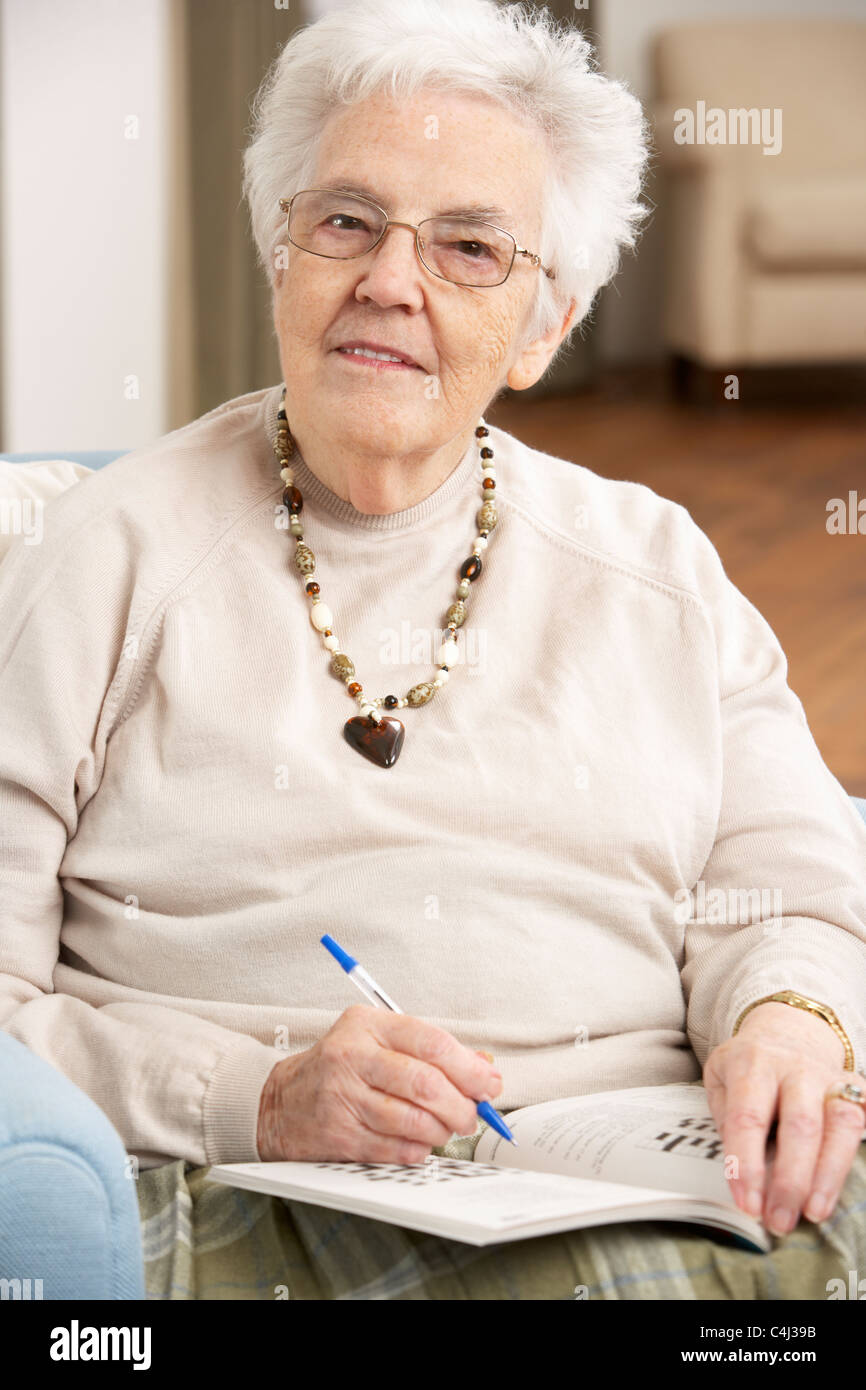 Completing crossword puzzle hires stock photography and images Alamy