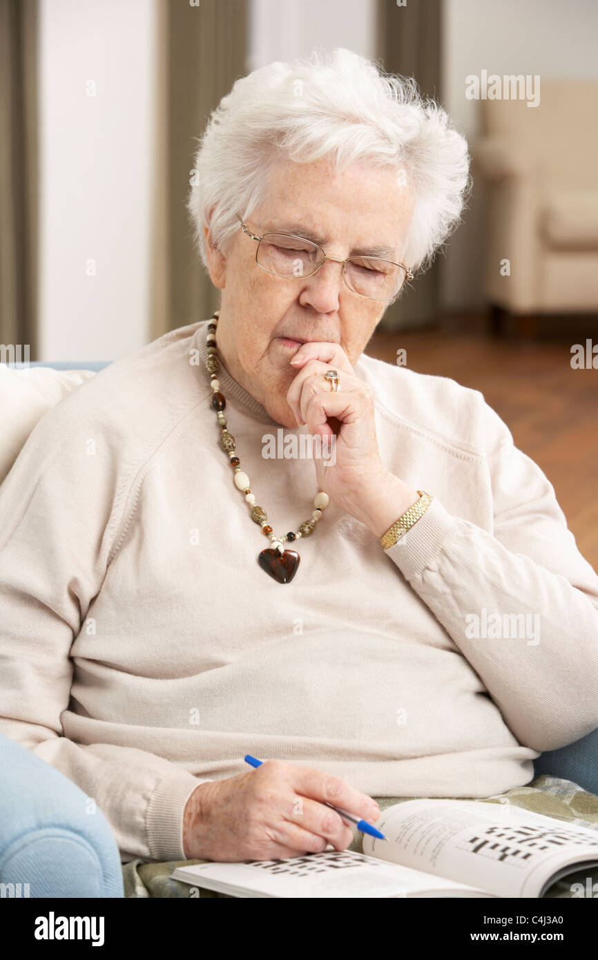 Completing crossword puzzle hires stock photography and images Alamy