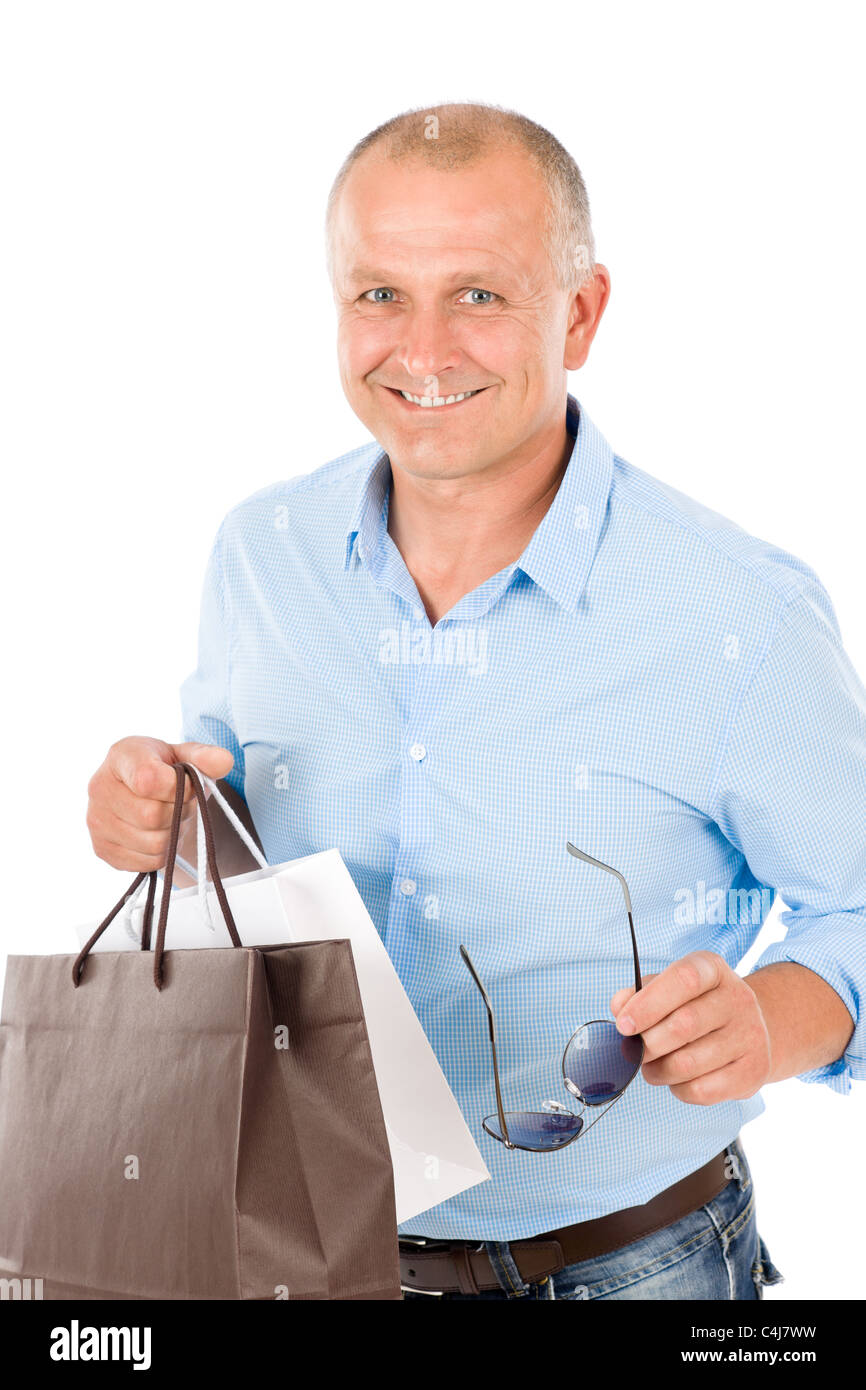Senior man with shopping bags hi-res stock photography and images - Alamy