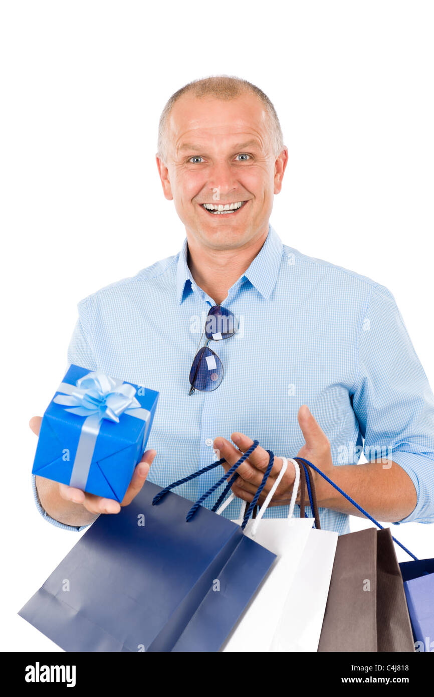 Elegant modern mature man hold shopping bags and present Stock Photo