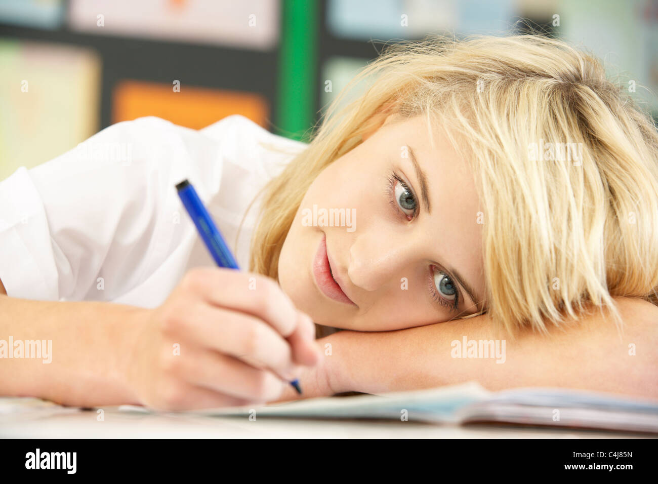 Female Teenage Student Studying In Classroom Stock Photo - Alamy