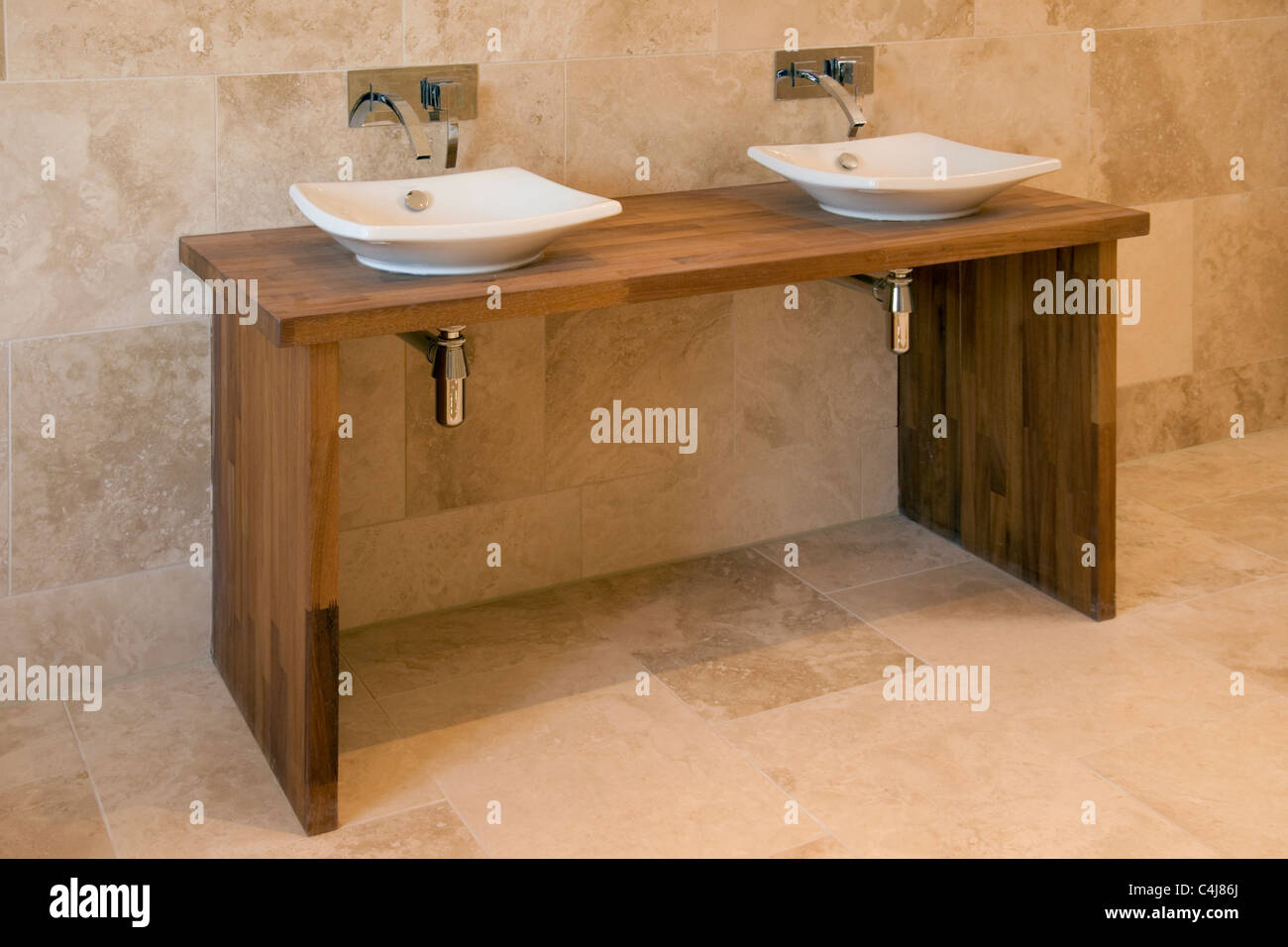 Contemporary his and hers wash basins. Stock Photo