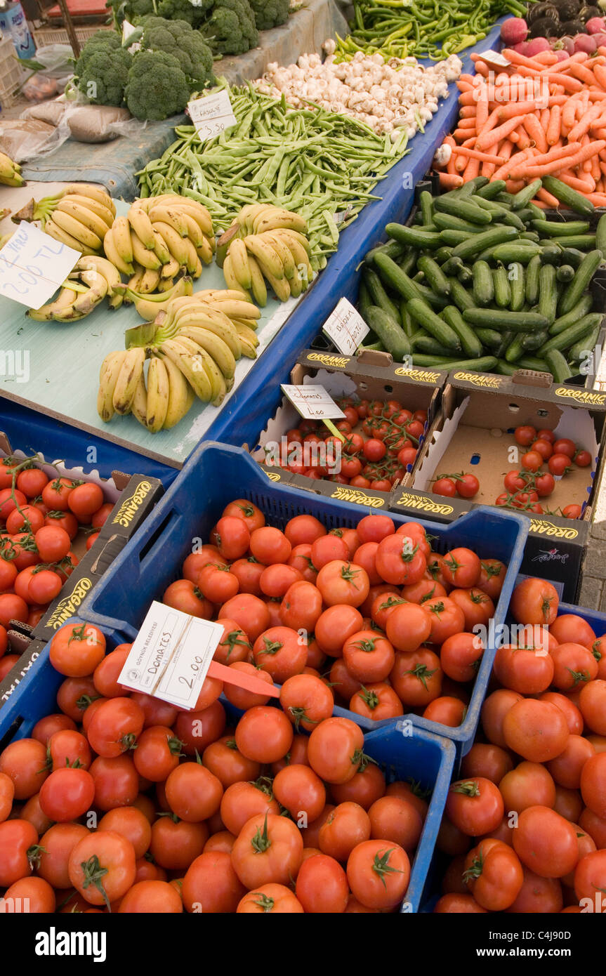 fresh fruit and veg vegetable vegetables tomato tomatoes banana bananas market stall stalls food markets for sale on display lay Stock Photo