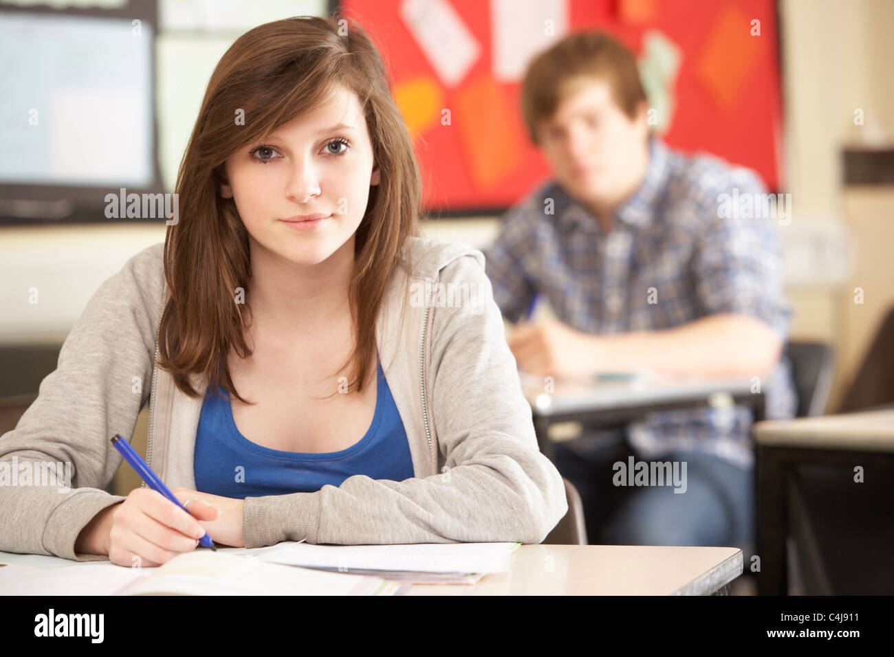 Female Teenage Student Studying In Classroom Stock Photo - Alamy