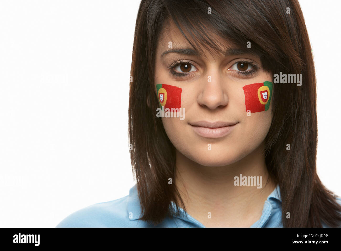Young Female Sports Fan With Portugese Flag Painted On Face Stock Photo