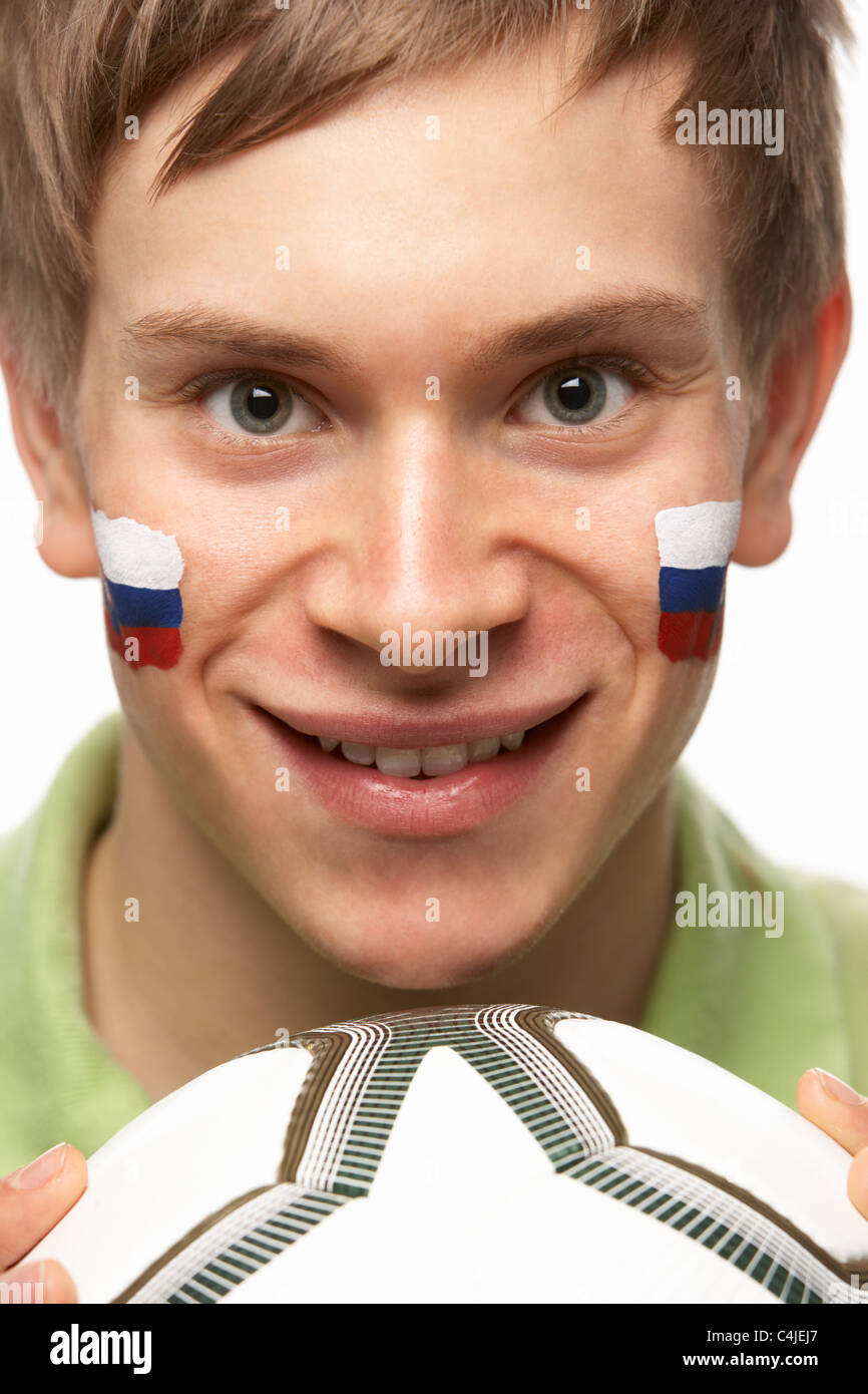 Young Male Football Fan With Slovakian Flag Painted On Face Stock Photo