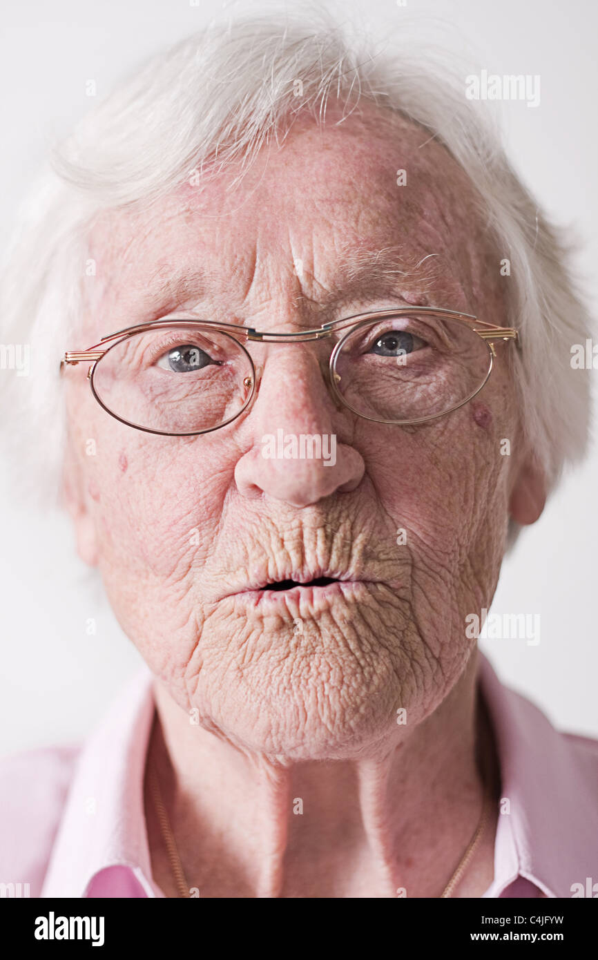 old lady with glasses Stock Photo