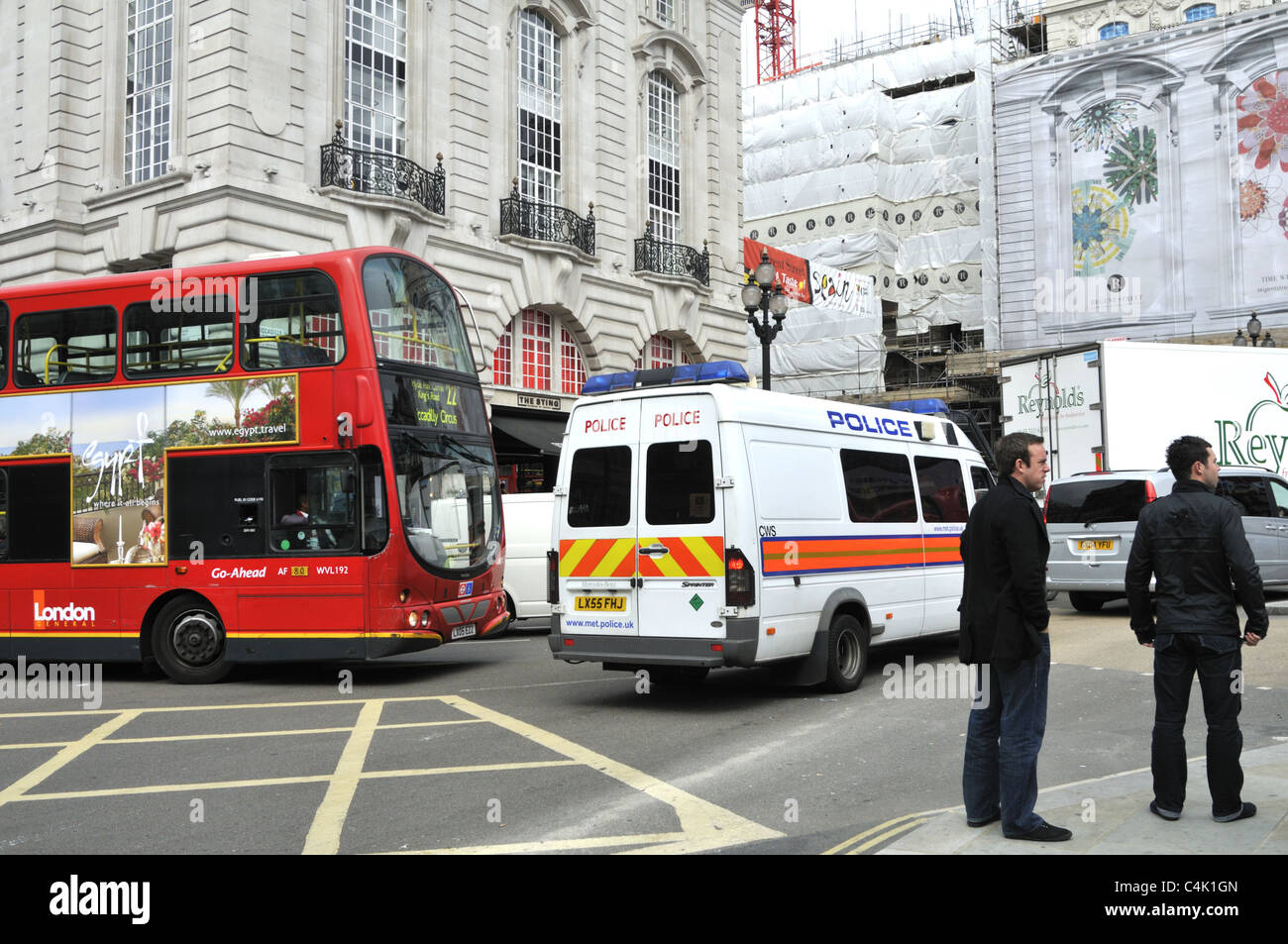 White police van in Piccadilly Circus London on the day of football European Champion Clubs' Cup final. Stock Photo
