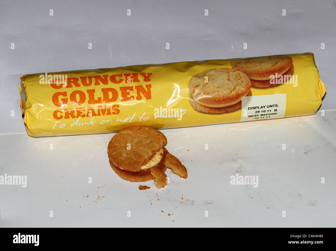packet of golden crunch biscuits with broken biscuit Stock Photo Alamy
